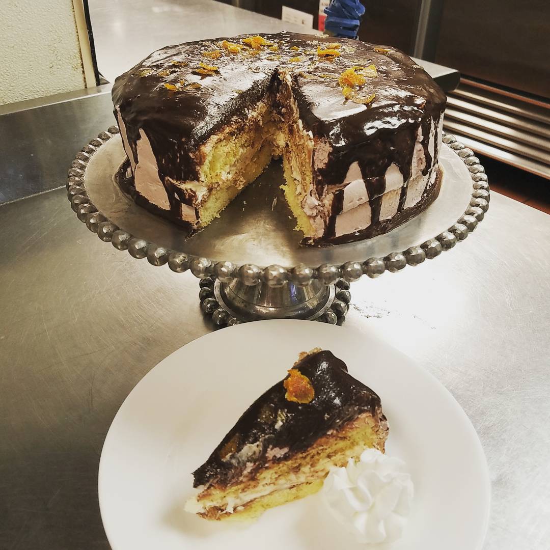 Va Bene Instagram Photo: @vabenecaffe Oh boy....this may be my favorite Sponge layers, orange syrup, Bailey's buttercream filled, Parfait Amour buttercream and ganache all over everything. #mariebrizard #parfaitamour #orangechocolate